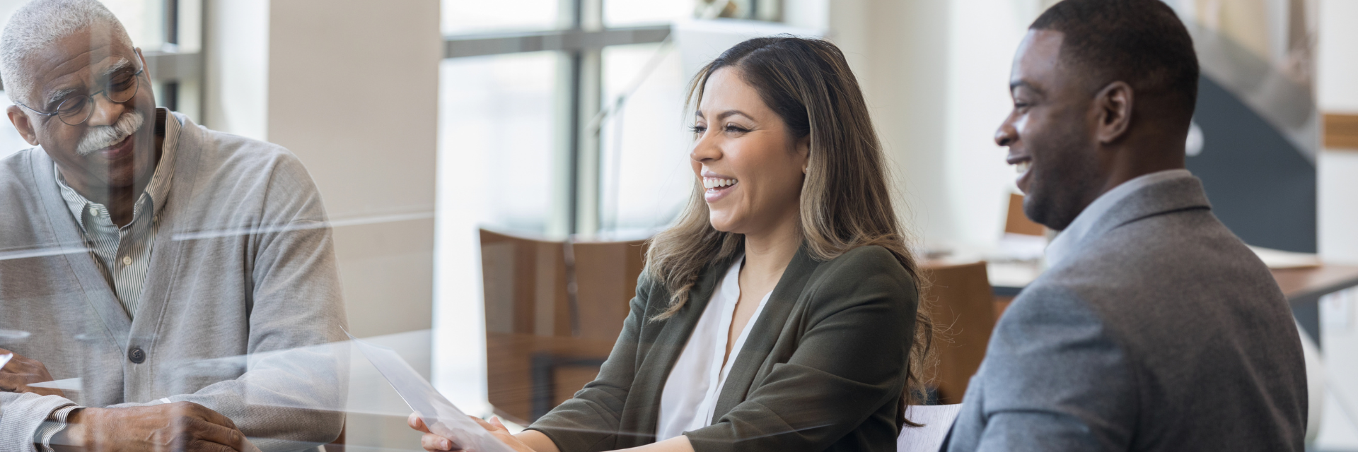 Financial Professionals working with a client. 